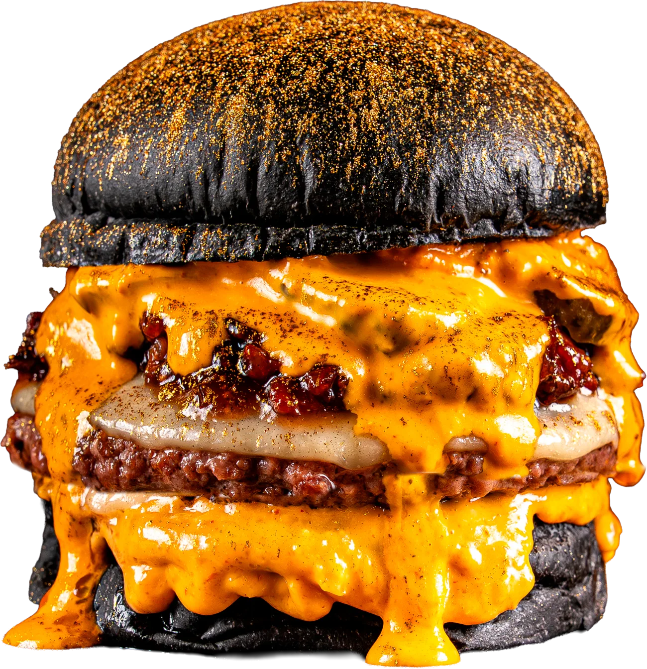 Hamburguesa sobre pan brioche negro con polvo de oro de Briox Baker, chorreando queso fundido