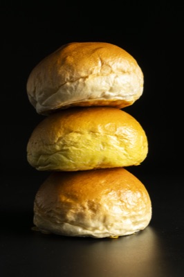 Panes brioche de Briox Baker · tres, apilados